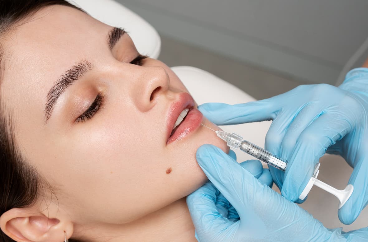 close up woman getting lip fillers