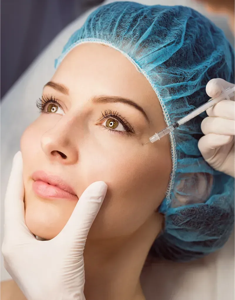 female patient receiving injection her face